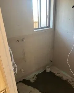 Bathroom stripped back for renovation with new pipework roughed in